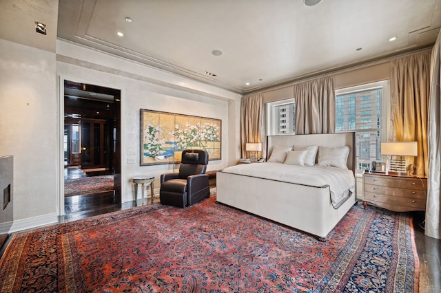 bedroom with hardwood / wood-style floors