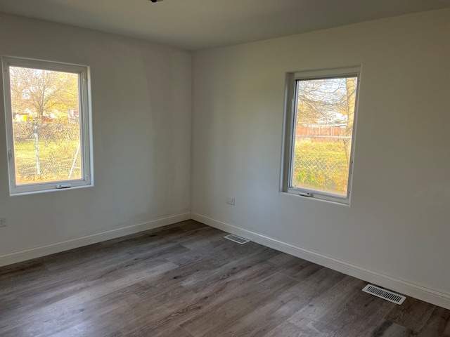 empty room featuring hardwood / wood-style floors