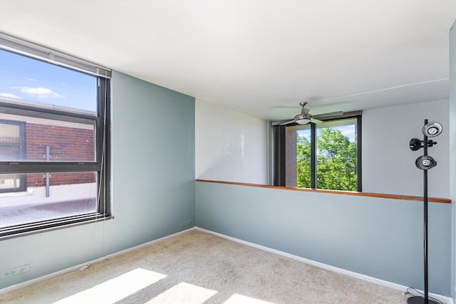 3041 S Michigan Ave Unit 504, Chicago, IL 60616 - carpeted spare room featuring ceiling fan and baseboards
