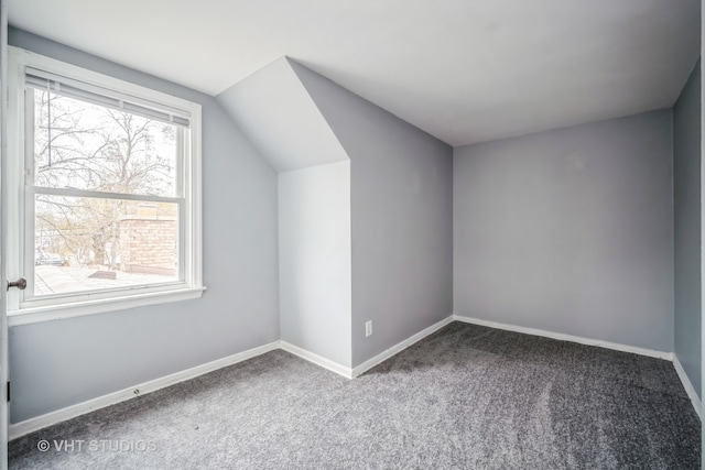 interior space featuring light carpet and multiple windows