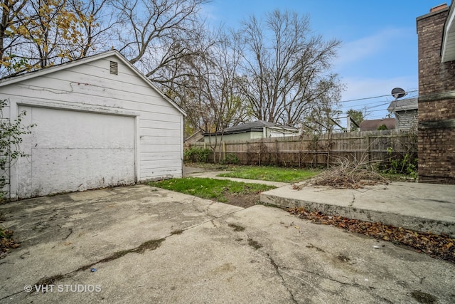 garage featuring a lawn