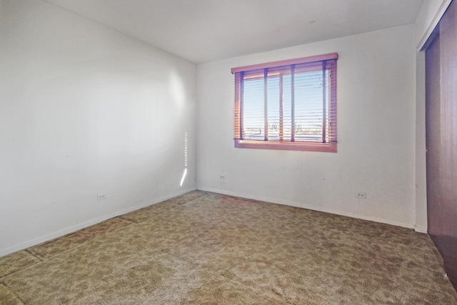 830 E 191st Pl Unit 709, Glenwood, IL 60425 - unfurnished bedroom featuring carpet flooring and baseboards