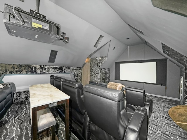 cinema room featuring lofted ceiling