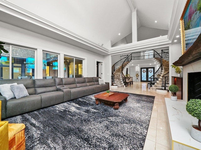 living room featuring light tile patterned flooring and high vaulted ceiling