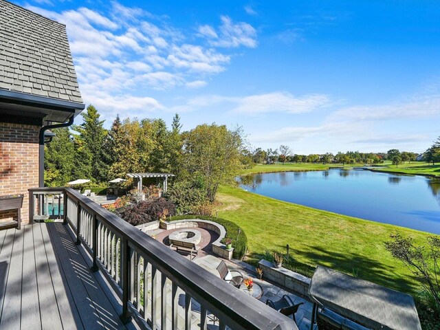 51 Hillburn Ln, North Barrington, IL 60010 - wooden terrace with a water view, an outdoor fire pit, and a lawn