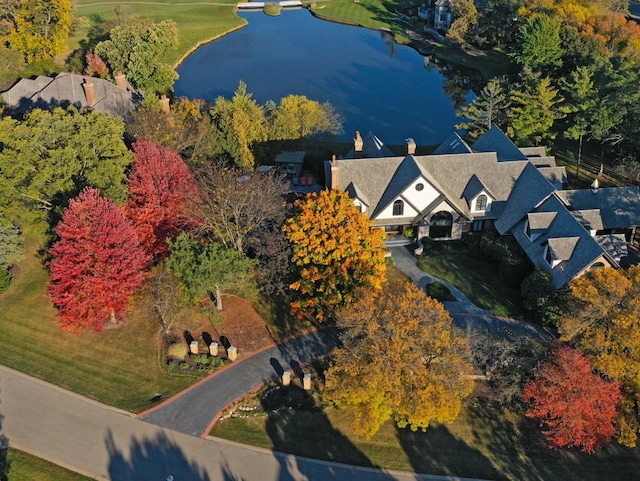 birds eye view of property featuring a water view