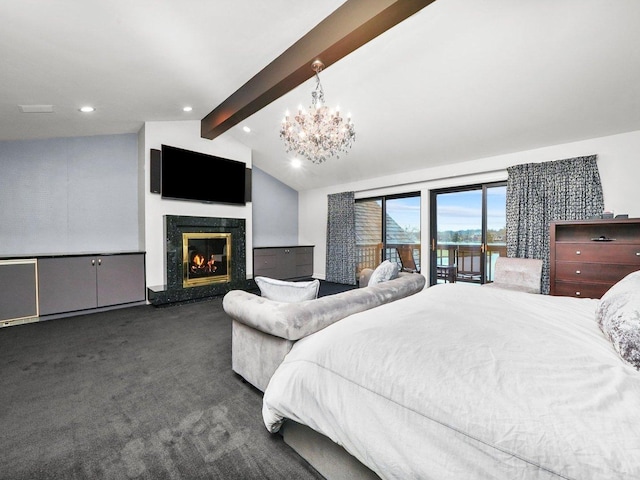 bedroom featuring access to exterior, vaulted ceiling with beams, an inviting chandelier, dark carpet, and a premium fireplace