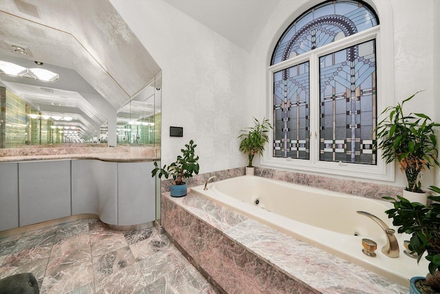 51 Hillburn Ln, North Barrington, IL 60010 - bathroom with vaulted ceiling, marble finish floors, a jetted tub, and vanity