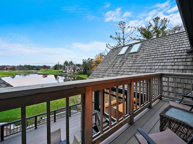 deck featuring a water view