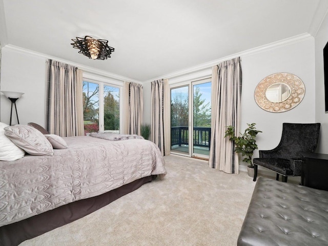 bedroom with multiple windows, access to exterior, crown molding, and carpet floors