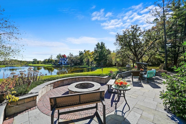 51 Hillburn Ln, North Barrington, IL 60010 - view of patio / terrace with an outdoor fire pit, a water view, and view of wooded area