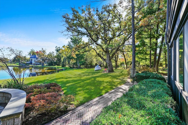 view of yard with a water view