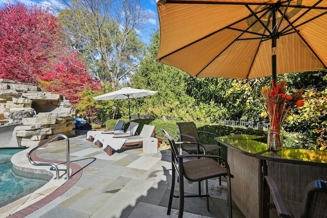 view of patio with a bar