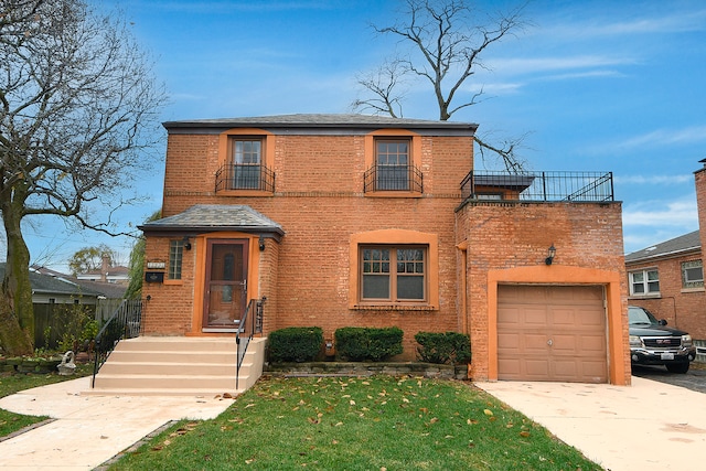 view of front of home featuring a front yard and a garage