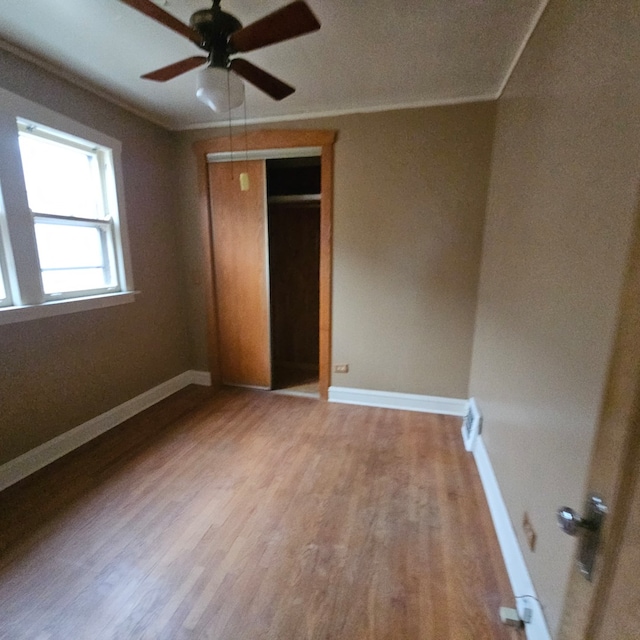 basement featuring gas water heater, sink, and washer / clothes dryer