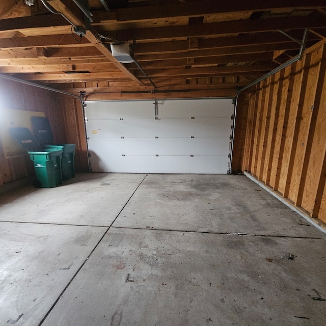 spare room featuring ornamental molding and light hardwood / wood-style flooring