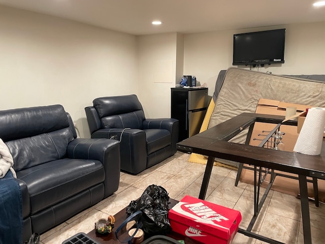 living room with light tile patterned floors