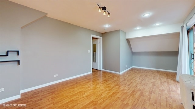 unfurnished room featuring light hardwood / wood-style flooring