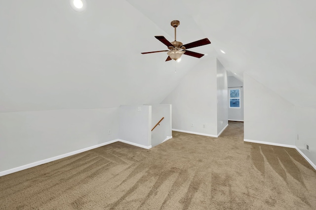 bonus room with carpet flooring, ceiling fan, and lofted ceiling