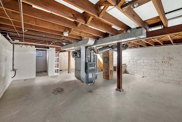 basement featuring heating unit