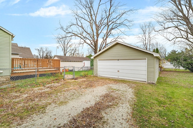 garage featuring a yard