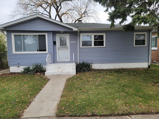 view of front of property with a front yard