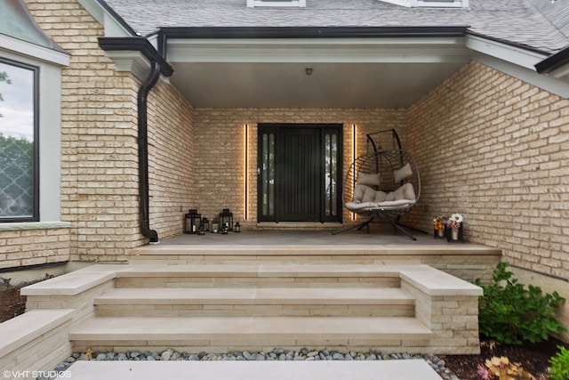 property entrance featuring covered porch