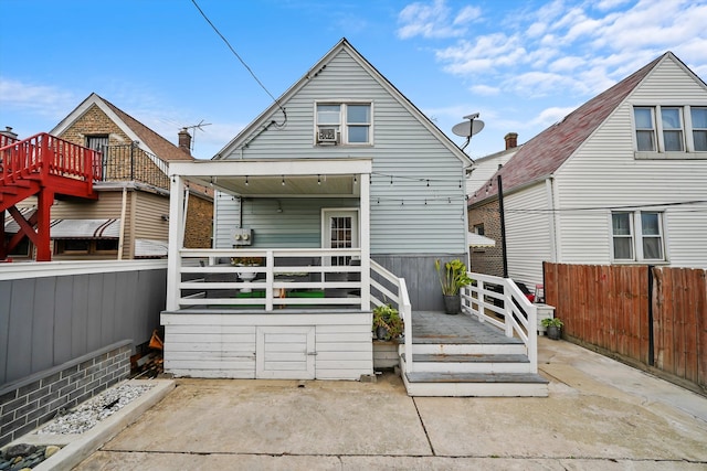 rear view of house with a patio