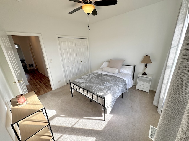 bedroom with ceiling fan and light hardwood / wood-style flooring