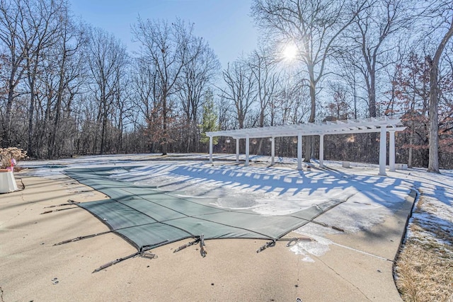 view of pool with a patio area and a pergola