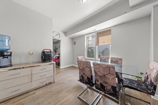 dining room with light hardwood / wood-style flooring