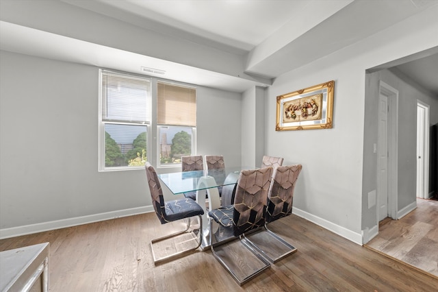 dining area featuring hardwood / wood-style flooring