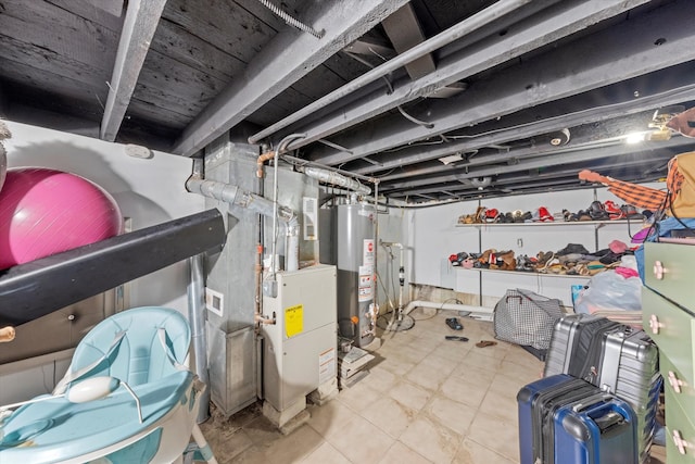 basement with heating unit and water heater