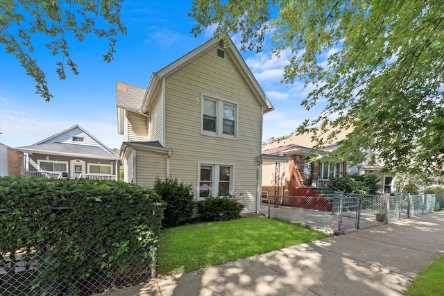 view of front of property with a front lawn