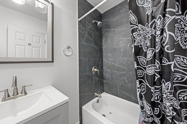 bathroom featuring vanity and shower / tub combo with curtain