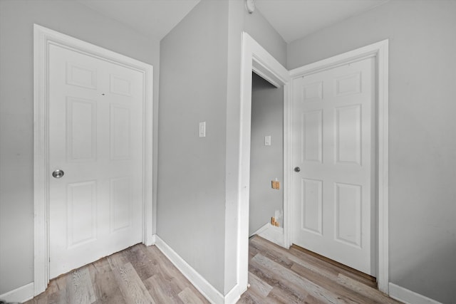 hall featuring light wood-type flooring