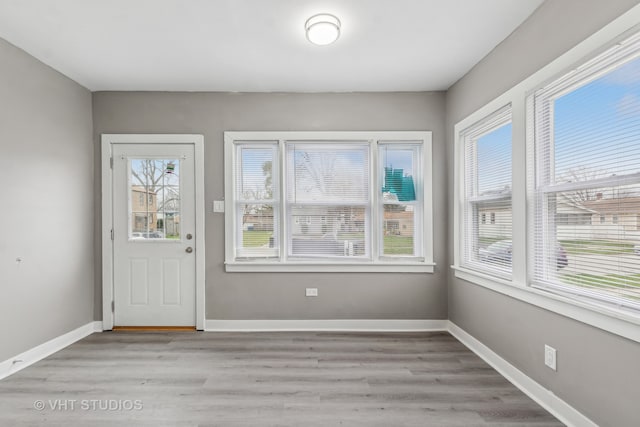 entrance foyer featuring light wood-type flooring