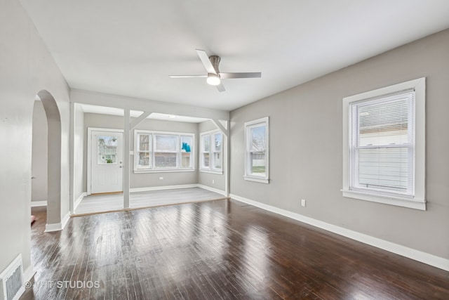 spare room featuring ceiling fan and wood-type flooring