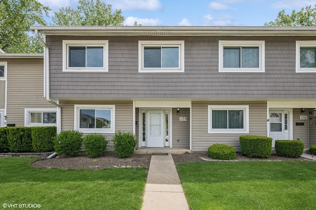 1130 Sandpiper Ct, Bartlett, IL 60103 - townhome / multi-family property with a front lawn