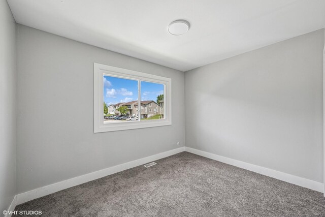 1130 Sandpiper Ct, Bartlett, IL 60103 - spare room featuring carpet flooring and baseboards