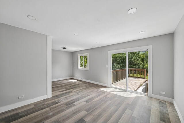 1130 Sandpiper Ct, Bartlett, IL 60103 - unfurnished room featuring baseboards, recessed lighting, and wood finished floors
