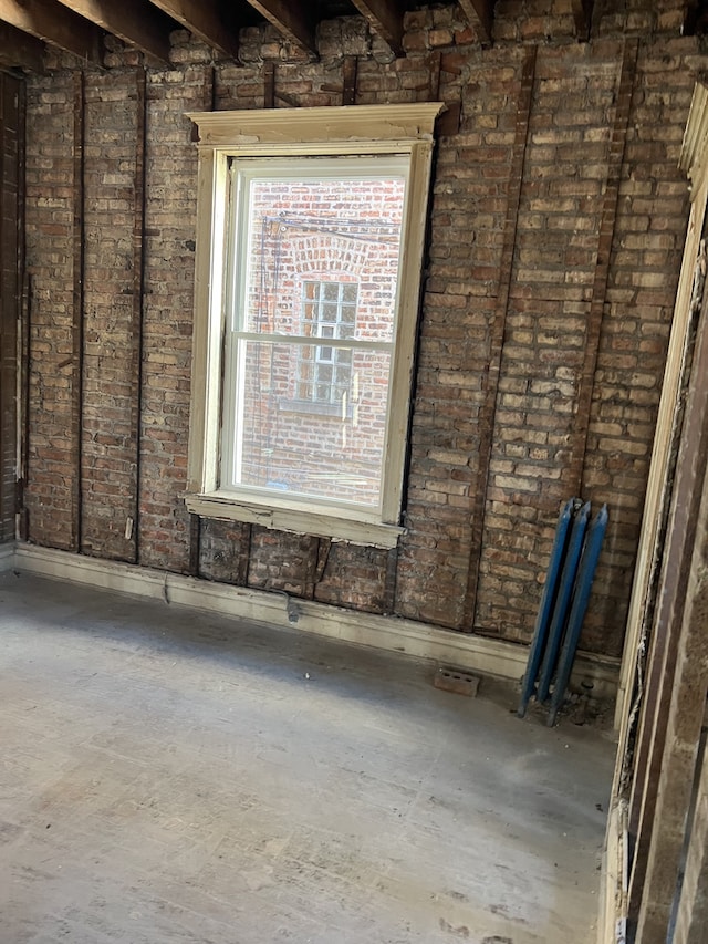 interior space featuring beam ceiling