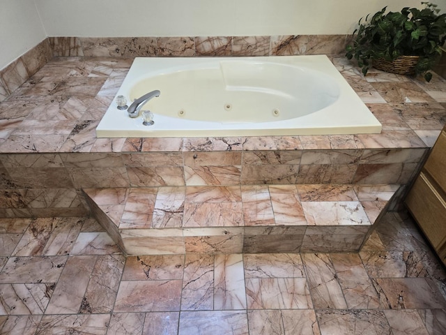 bathroom featuring a relaxing tiled tub