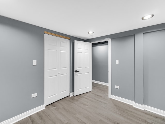 unfurnished bedroom featuring light hardwood / wood-style floors