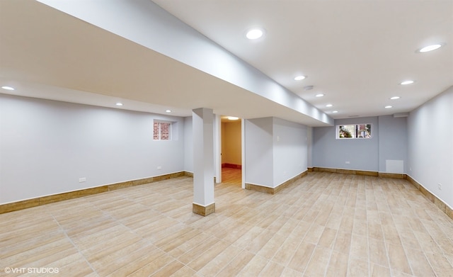 basement featuring light hardwood / wood-style floors