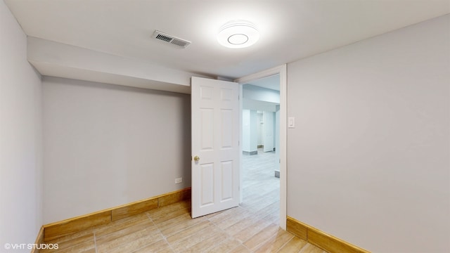 unfurnished bedroom featuring light wood-type flooring