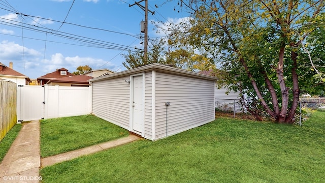 view of outdoor structure with a yard