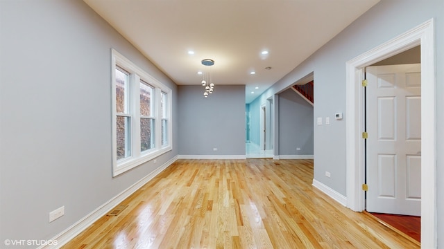 empty room featuring light hardwood / wood-style flooring