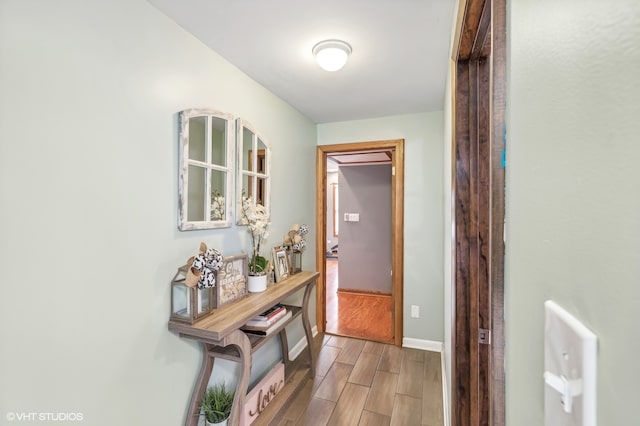 hallway featuring hardwood / wood-style floors