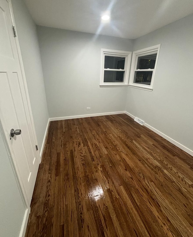 stairway featuring wood-type flooring